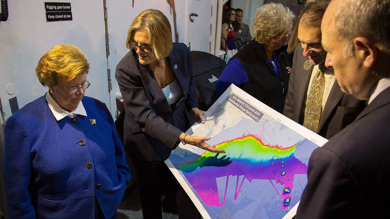 NOAA Administrator Kathy Sullivan and Chief Scientist Rick Spinrad demonstrate the value of mapping efforts sponsored by the Office of Ocean Exploration and Research off the US East Coast to Senator Barbara Mikulski.