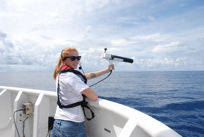 Kate von Krusenstiern, an Explorer-in-Training from Bellingham, Washington, casting an expendable-bathy-thermograph (XBT) off the stern of the ship to measure the temperature of the water column. We use this data along with measurements of salinity to create sound speed profiles, which are used to correct the multibeam data in real-time.