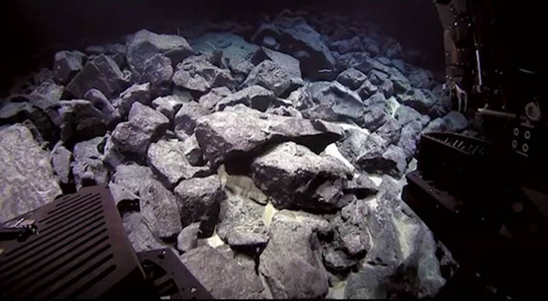 This photo shows a video still taken while we were traversing over a field of broke up dike rocks. These rocks are typically very angular when they are broken apart, as the ones pictured in this image.