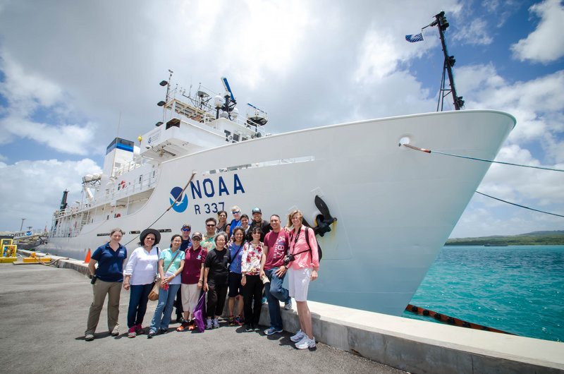 Before getting underway, outreach activities included ship tours and public talks to get the word out about the expedition. A group of teachers in Guam took part in NOAA OER’s “Why Do We Explore” professional development workshop. Here, the participants are photographed in front of the ship following a tour.