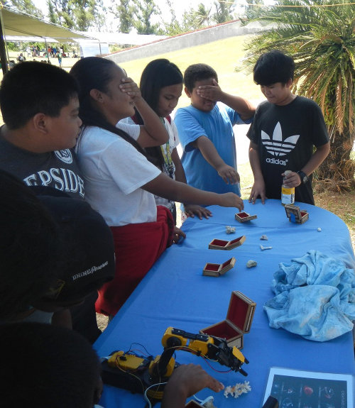 Due to the limited time per group, students who didn’t use the robotic arm worked in pairs to collect their own samples, with the “chief scientists” giving directions to the ROV operators, who had their eyes covered and moved the “claw” only when directed to do so.