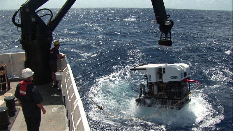 Remotely-operated vehicle Deep Discoverer during launch from NOAA Ship Okeanos Explorer for its daily dive to explore the deep sea.