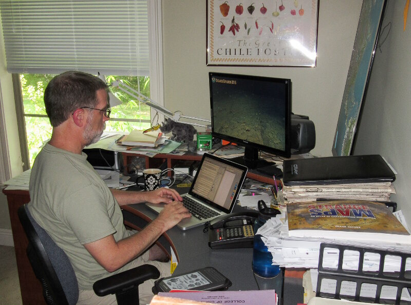 Scientist Scott France participates in the dives from his home office via telepresence.