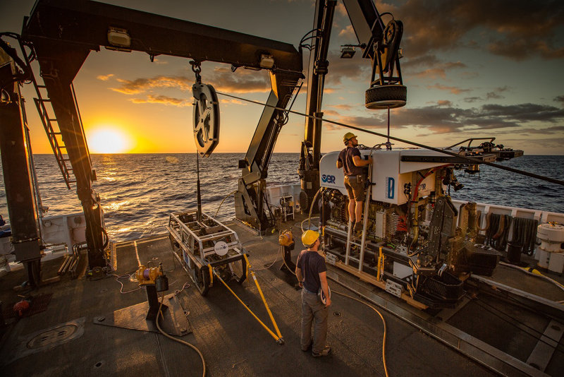 Remotely operated vehicle Deep Discoverer being prepared for deployment on the Okeanos aft deck.