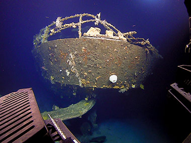 The stern of the Amakasu Maru No. 1 with her name still visible 73 years after she was sunk.