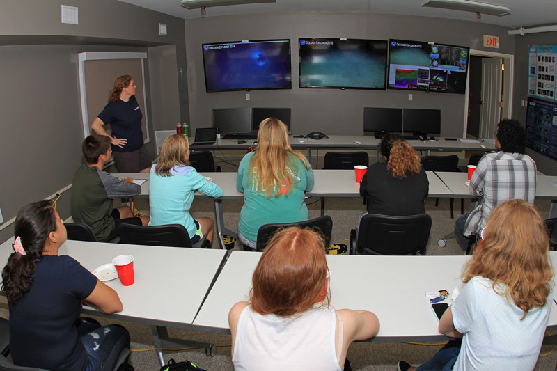 Deb working with interns at the Harbor Branch Exploration Command Center.