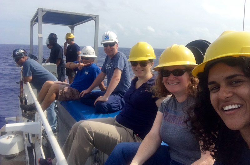 Deb and the rest of the expedition science team watch a remotely operated vehicle recovery during the Deepwater Exploration of the Marianas Expedition.