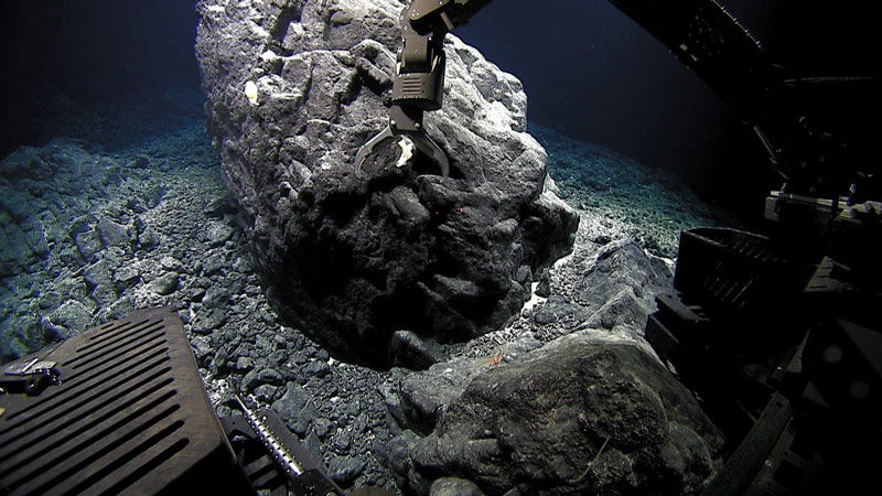Scientists use Deep Discoverer to collect a rock sample from a hard-substrate environment.