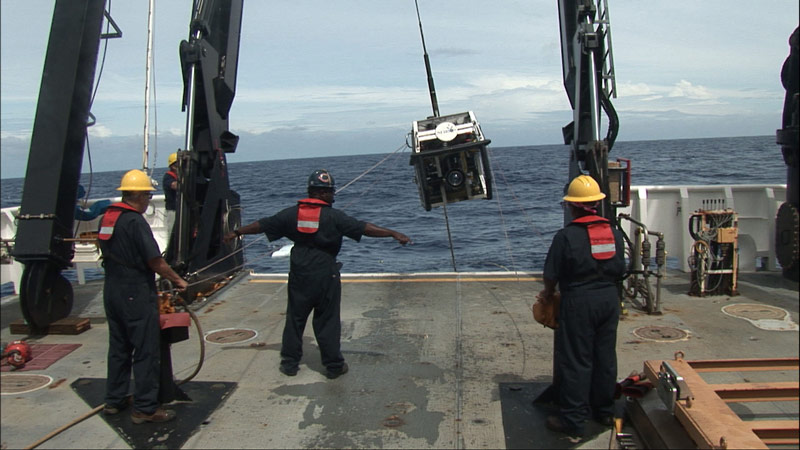 Able-bodied Seaman Abe Mcdowell instructs Able-bodied Seaman Nicky Applewhite and General Vessel Assistant Frank Polonak during launch of ROV Seirios.