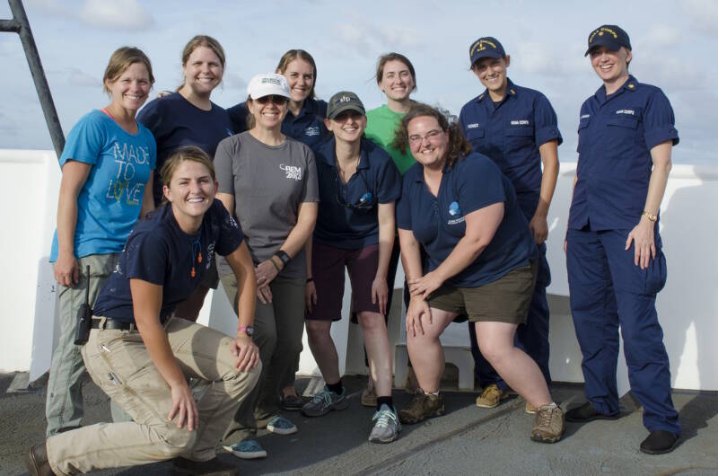 The women on board the Okeanos Explorer during the Discovering the Deep: Exploring Remote Pacific Marine Protected Areas expedition. These women represent all aspects of life at sea, from the officers, deck crew, engineers, support staff, and scientists.