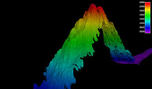 Seamount we mapped on the return voyage to Honolulu. This Mountain in the Deep rose approximately 3,000 meters (9,840 feet) from the sea floor - a fitting end to this spectacular journey! Seamount we mapped on the return voyage to Honolulu. This Mountain in the Deep rose approximately 3,000 meters (9,840 feet) from the sea floor - a fitting end to this spectacular journey!