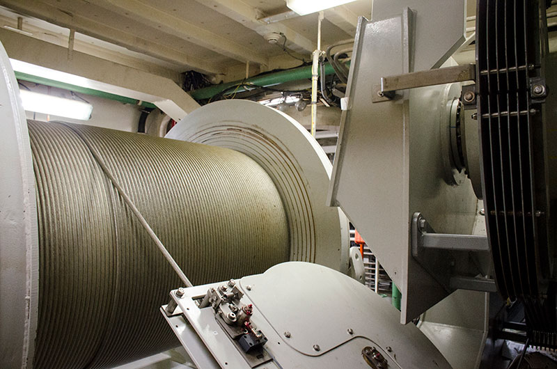 The eight-kilometer-long steel cable that connects remotely operated vehicle Seirios with NOAA Ship Okeanos Explorer. This tether, which is unspooled from a storage drum within the ship, brings electrical power and signals to the ROV while returning live video feeds to the ship.
