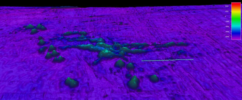 ukośny widok skupionego obszaru mapowania Musicians seamounts podczas ekspedycji mapowania Telepresencji Musicians Seamounts, z linią 100 mil morskich narysowaną dla skali.