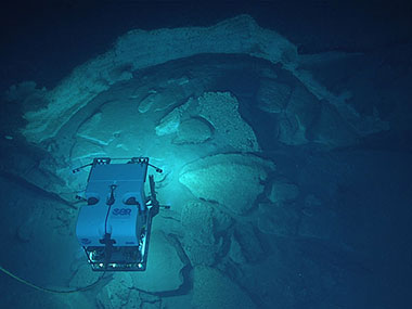 Remotely operated vehicle Deep Discoverer investigates some of the striking geology seen during the dive.
