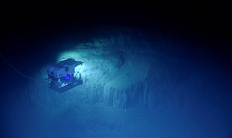 The remotely operated vehicle (ROV) <em>Deep Discoverer</em> surveys this interesting geological feature during the final dive of the Windows to the Deep 2018 expedition.