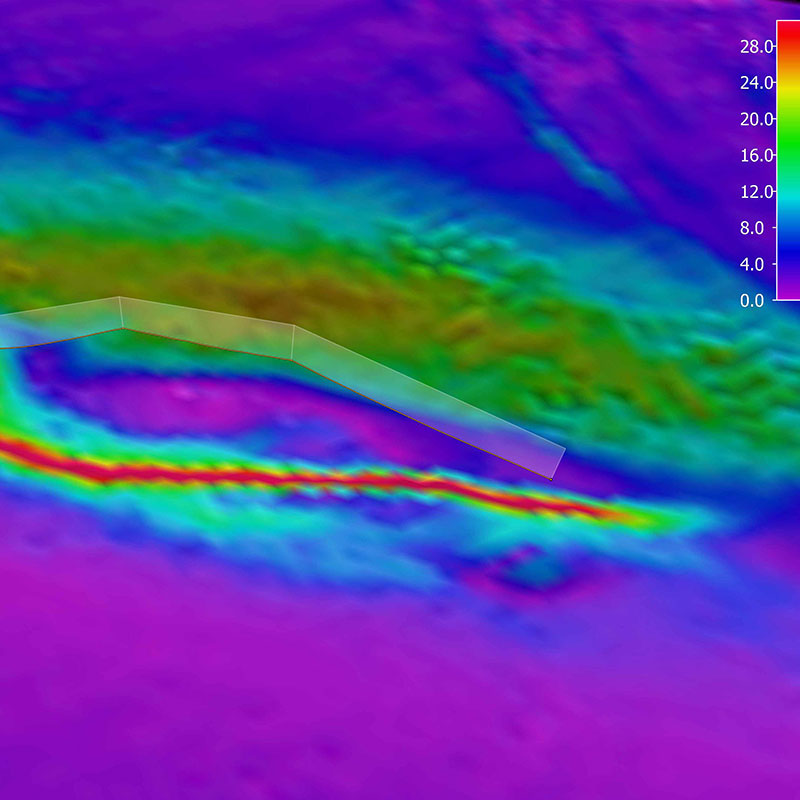 3D view of the planned ROV track for Dive 13 shown as orange line with white curtain protruding from the slope. The background represents the seafloor depth color-coded with slope in degrees. The warmer the color, the steeper the slope. 
