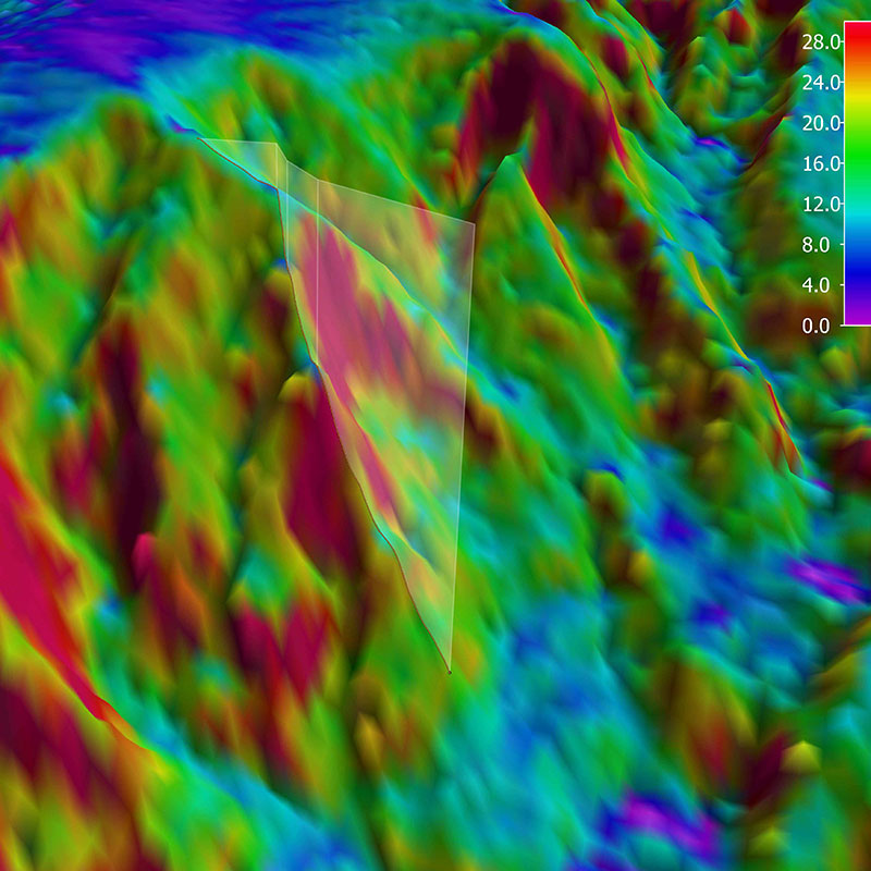 3D view of the planned ROV track for Dive 14 shown as orange line with white curtain protruding from the slope. The background represents the seafloor depth color-coded with slope in degrees. The warmer the color, the steeper the slope. 