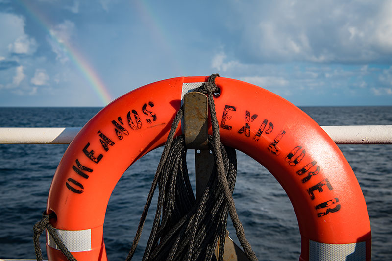 A rainbow over the Okeanos Explorer as the ship makes its way into San Juan.