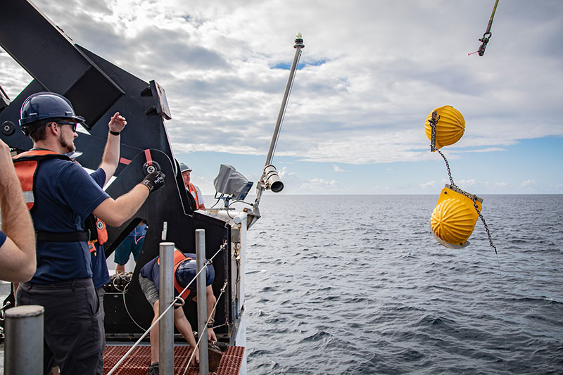 The team conducting a calibration of the ROV positioning system. Image courtesy of Art Howard, GFOE, Exploring Deep-sea Habitats off Puerto Rico and the U.S. Virgin Islands.