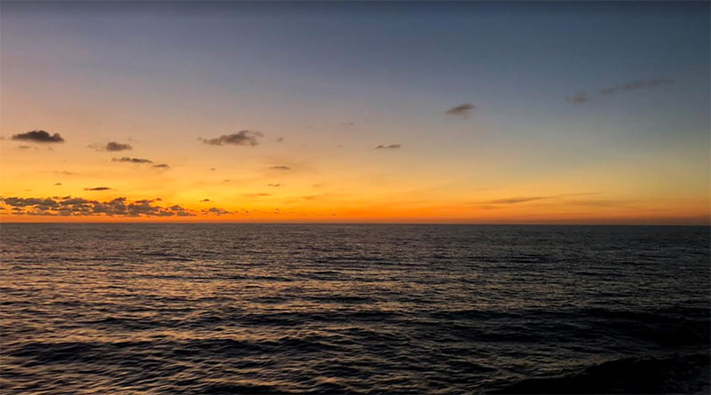 Sunset off the port side of the Okeanos Explorer.