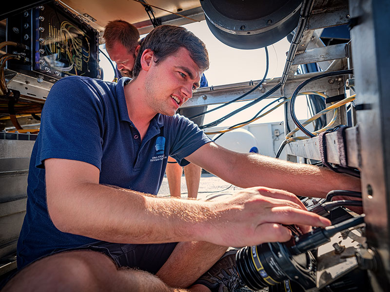 The remotely operated vehicle (ROV) engineers prepare ROV Deep Discoverer for this exploration mission.