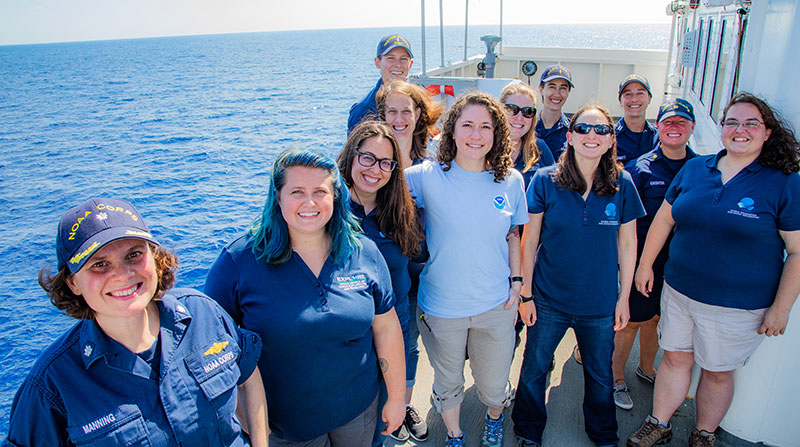 CDR Manning (far left) on the deck of the Okeanos Explorer with some members of her crew.