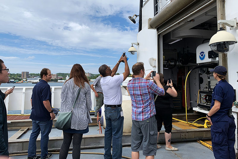 Visitors take photos of ROV Deep Discoverer during the August 23, 2019 ship tours in Dartmouth, Nova Scotia.