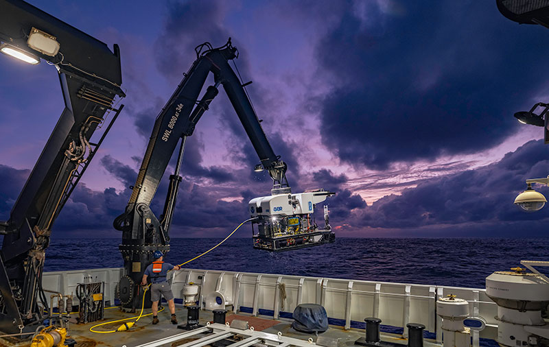 Our team of engineers recovers ROV Deep Discoverer at night after Dive 02, an extended dive, of the 2019 Southeastern U.S. Deep-sea Exploration. Image courtesy of Lars Murphy, Global Foundation for Ocean Exploration, 2019 Southeastern U.S. Deep-sea Exploration.