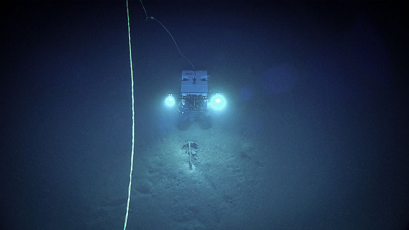 Remotely operated vehicle (ROV) Seirios images ROV Deep Discoverer as it more closely examines one of two anchors found while exploring the remains of what is likely a 19th century whaler during Dive 02 of the 2002 ROV and Mapping Shakedown.