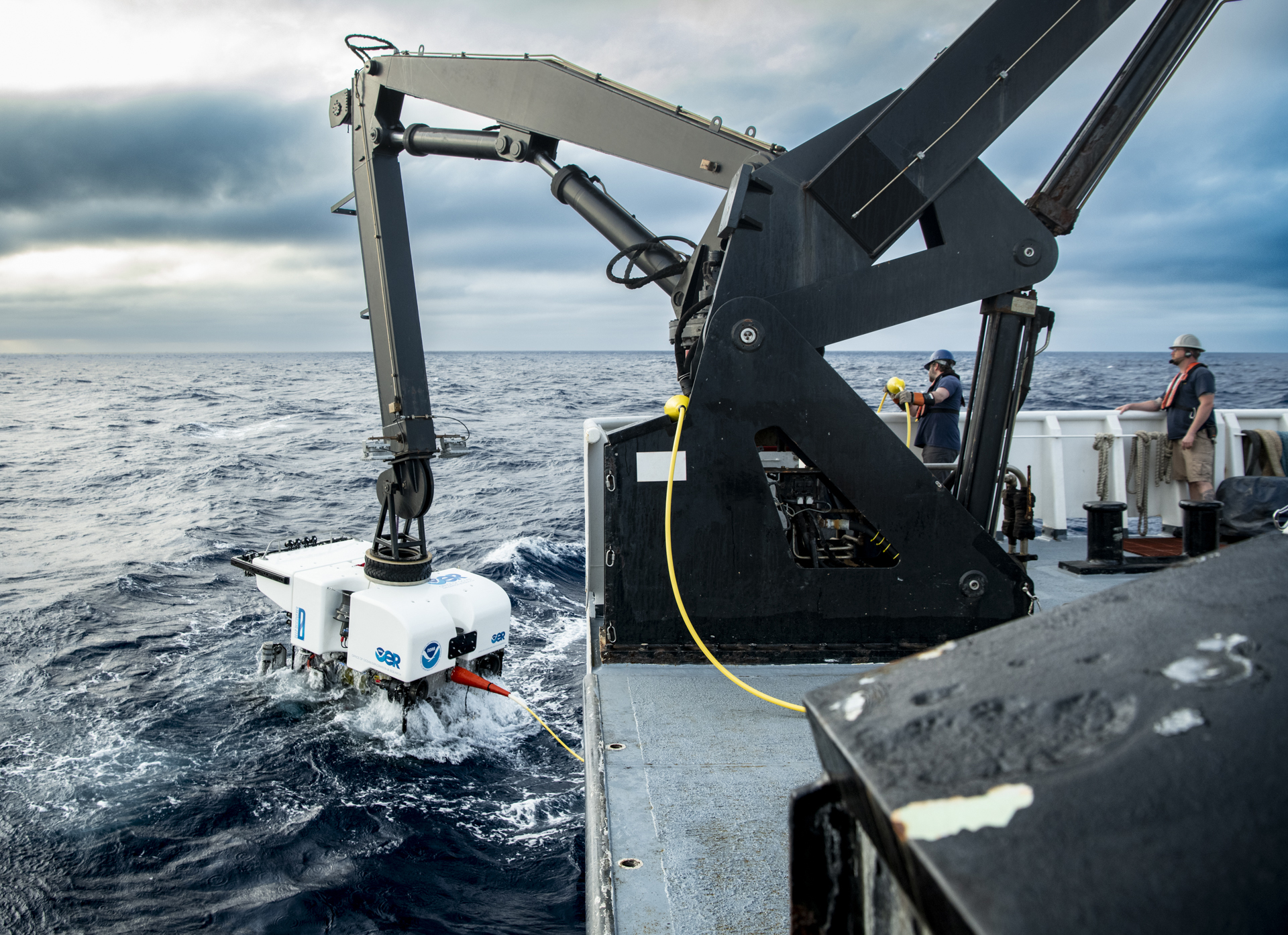 Deck crew and engineers on NOAA Ship Okeanos Explorer recover remotely operated vehicle Deep Discoverer from the depths of the Gulf of Mexico after Dive 03 of the 2022 ROV and Mapping Shakedown.