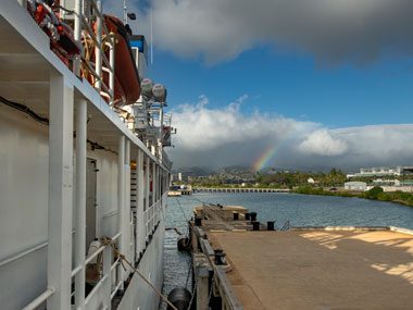 A rainbow seen from NOAA Ship Okeanos Explorer while the ship was docked in Honolulu, Hawaiʻi, prior to the start of the Beyond the Blue: Hawaiʻi Mapping expedition.
