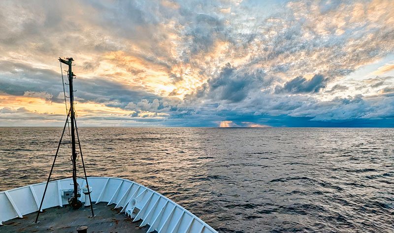 A beautiful sunrise captured from the bow of NOAA Ship Okeanos Explorer as the crew sailed through the Gulf of Alaska during the Seascape Alaska 1: Aleutians Deepwater Mapping expedition.