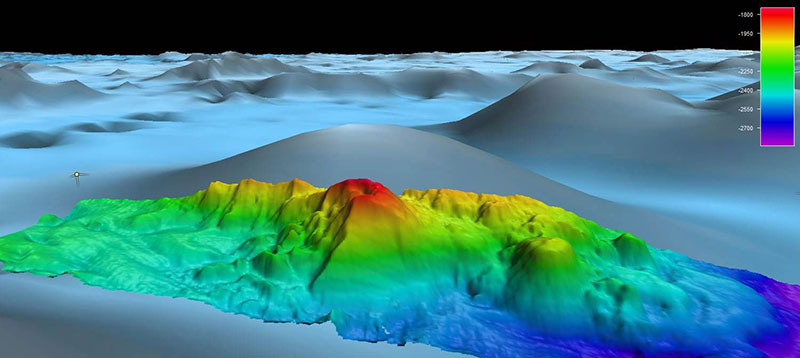 This knoll is located on the flank of a larger seamount in the eastern Pacific Ocean about 200 miles off the Costa Rican coast in 2,500 meters of water. The feature, which rises 500 meters above the surrounding seafloor, was mapped using multibeam sonar during the Tropical Exploration 2015 expedition. Prior to being mapped by the Okeanos Explorer, the knoll was an poorly distinguished feature on a gravity anomaly map derived by satellite altimetry.