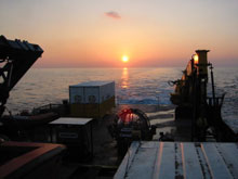 image of sunset off the aft deck