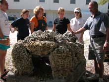 girl scouts examine artificial reef
