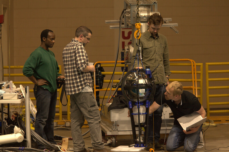 The Second Star Robotics and National Geographic team working on the Driftcam.