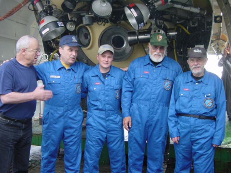 Chief submersible pilot Anatoly Sagalevitch (left), CAPT Craig McLean (NOAA), LTJG Jeremy Weirich (NOAA), Larry Murphy (NPS), and Canadian microbiologist Dr. Roy Cullimore prepare for their dives to the Titanic.