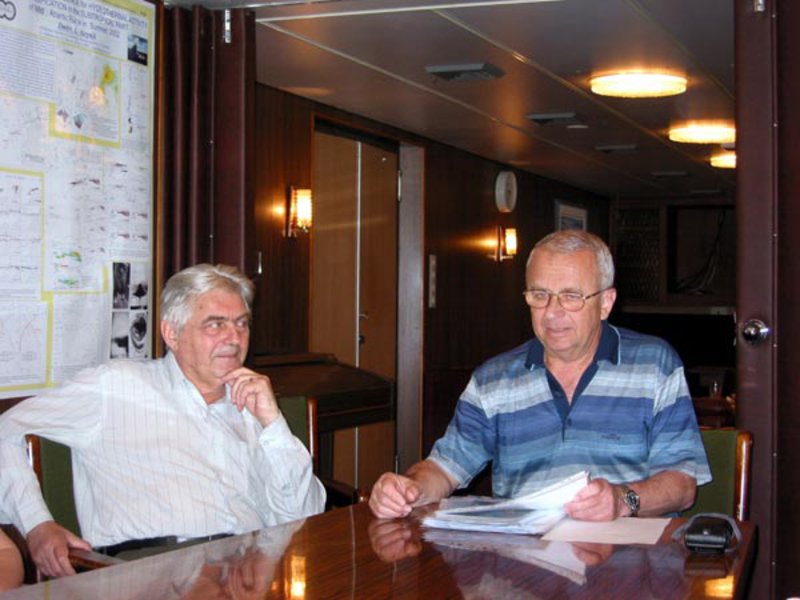 Chief submersible pilot Dr Anatoly Sagalevitch (right) and Chief Scientist Yuri Bogdanov present the scientists with images from their dives.